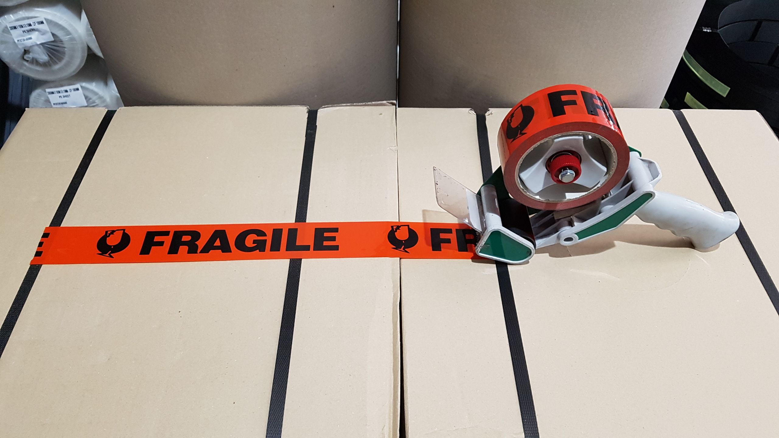 fragile_tape_with_gun